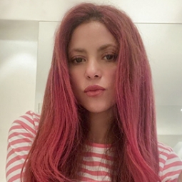 Shakira Goes Rosy Red